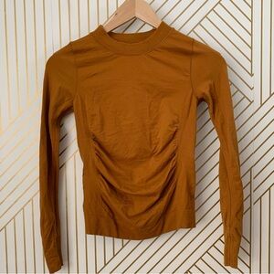 Athleta Wool blend Foresthill ascent seamless top size XXS mesh like back gold